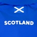 Scotland Mens Travel Tech Polo - Royal 2023 - Top of the Back  Scotland Mens Travel Tech Polo - Royal 2023 - Top of the Back